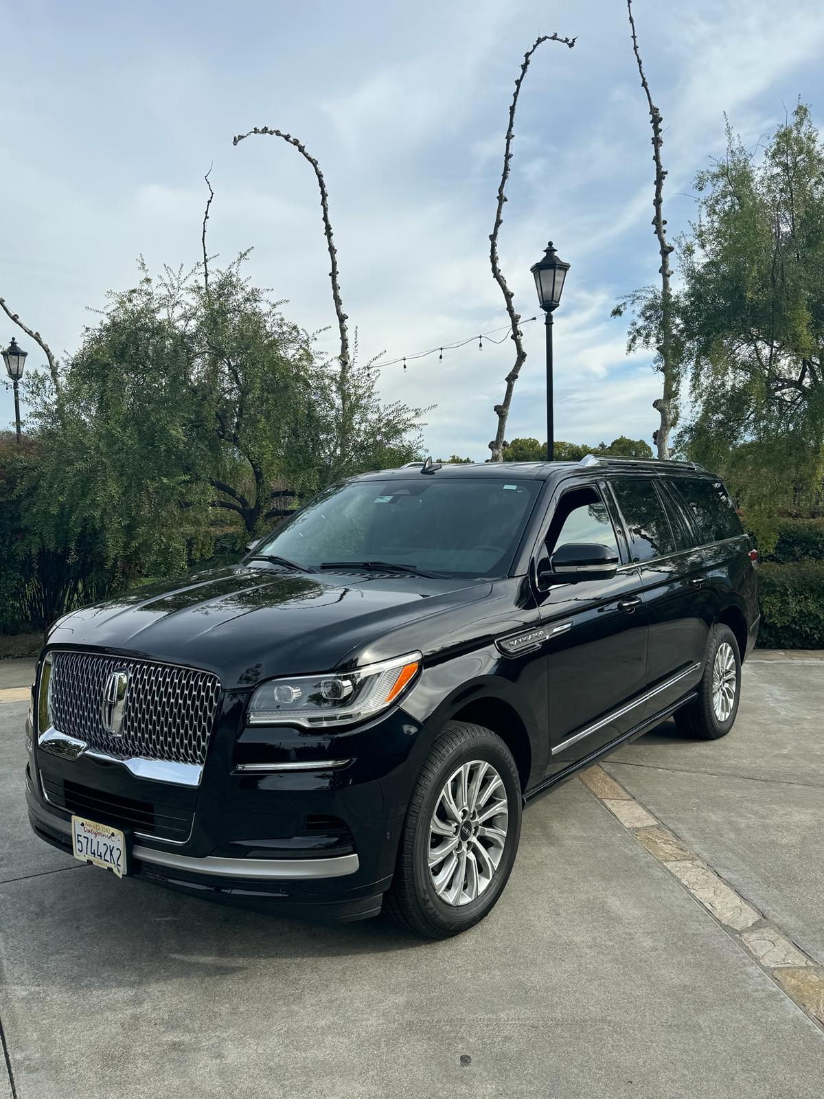 Black luxury SUV for Alamo airport transportation to SJC