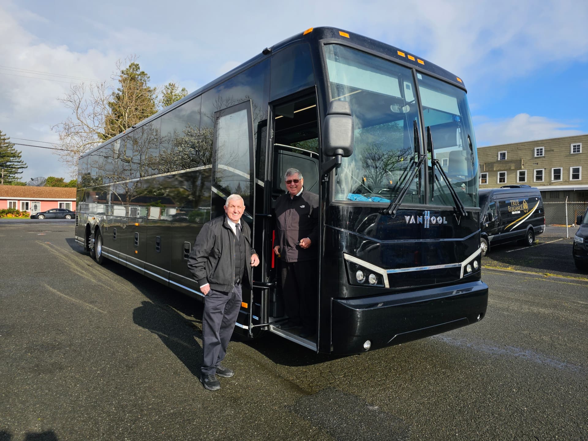 Black Van Hool charter bus with professional chauffeurs serving Tri-Valley group transportation